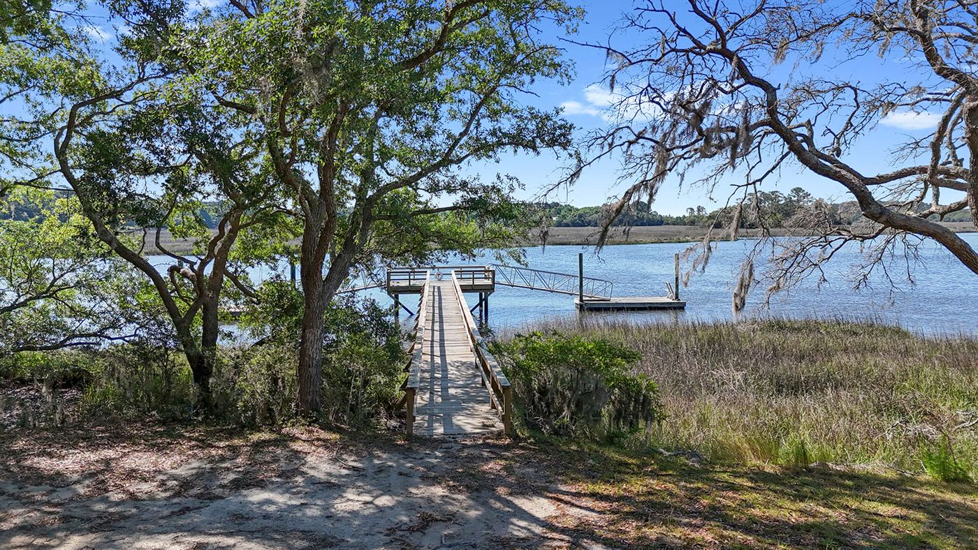 Private dock extending through the marsh at Bull Point